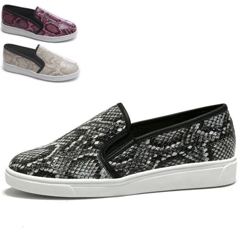 snake print slip on sneakers.